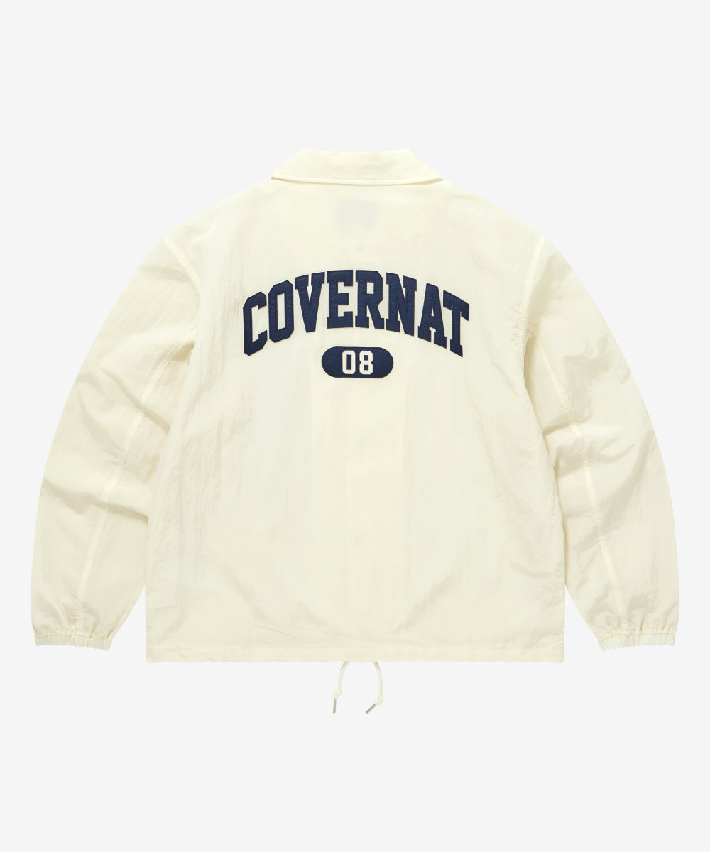 Covernat [Worn by Yunji Choi] C Logo Coach Jacket Ivory