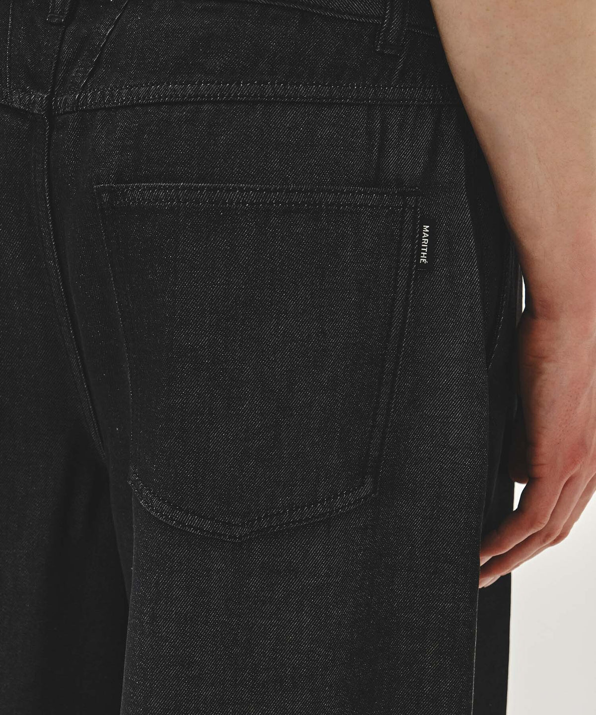 MARITHE M WIDE FIT TUCK DENIM PANTS black